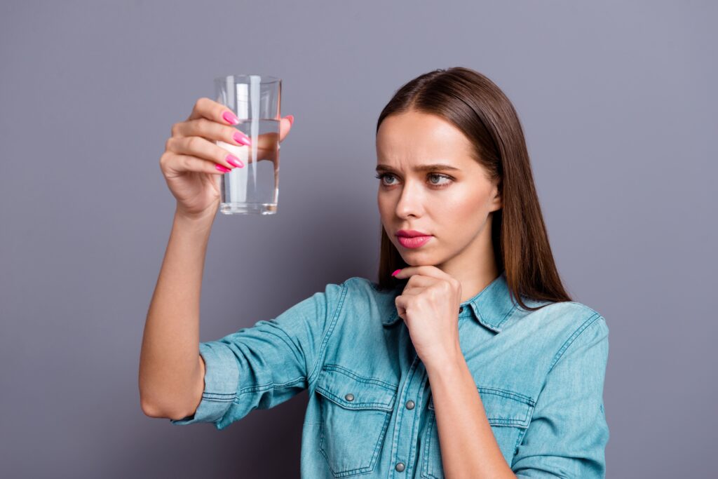 Hyperbaric Therapy Chambers image showing girl holding a glass of clear liquid
