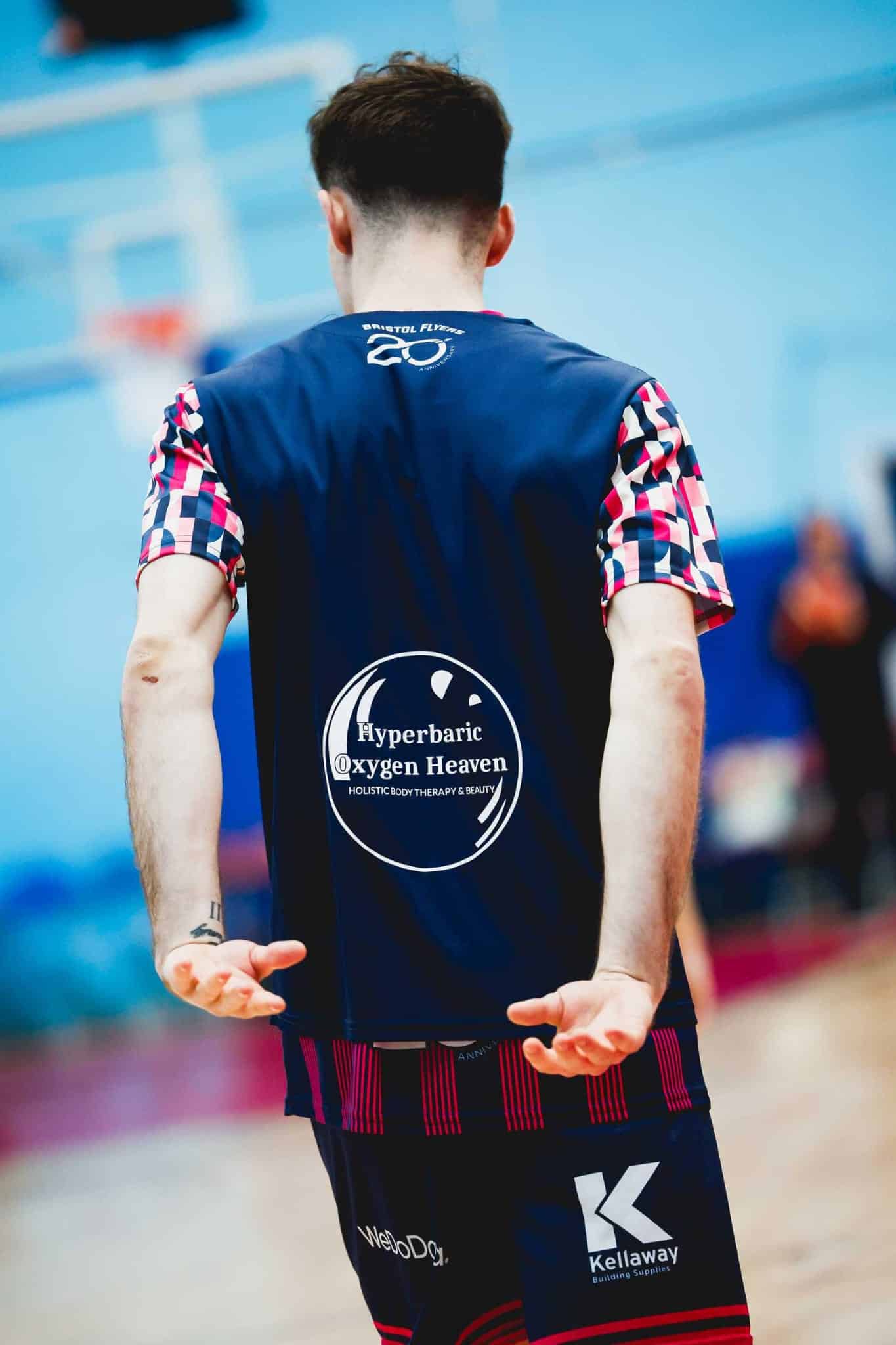 Hyperbaric Oxygen Heaven’s sponsor logo on a Bristol Flyers basketball shirt